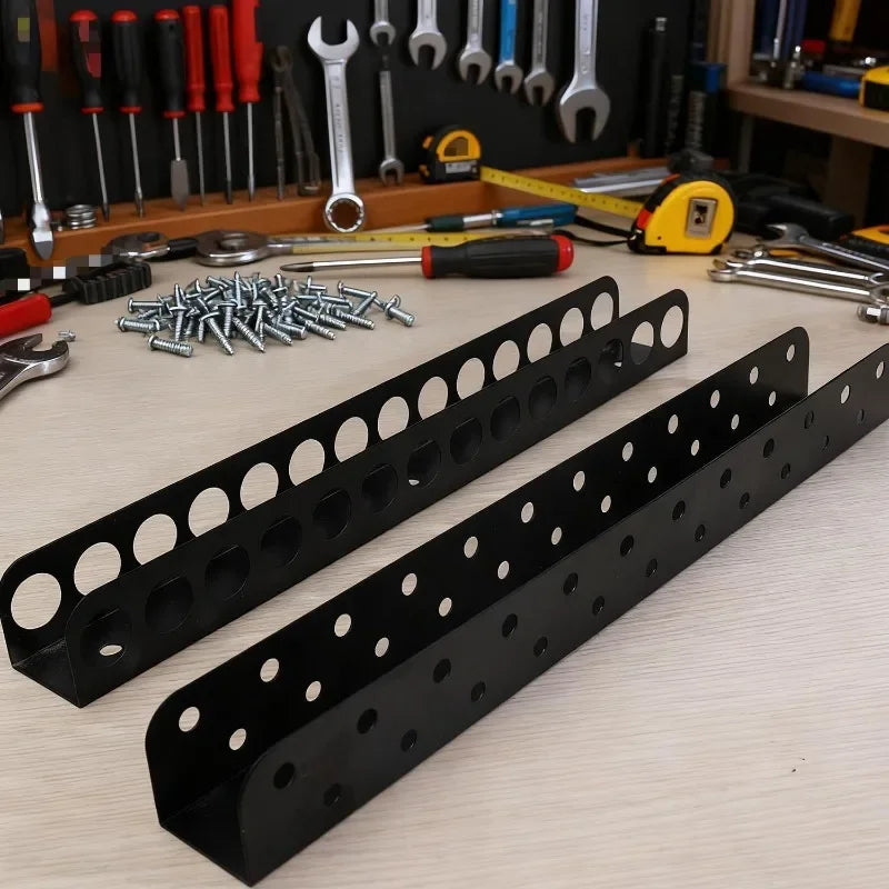 A black wall-mounted tool organizer rack displaying various hand tools like pliers, screwdrivers, and wrenches.