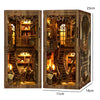 A detailed wooden book nook kit featuring intricate shelving, stairs, and LED lighting, displayed in a vertical format.