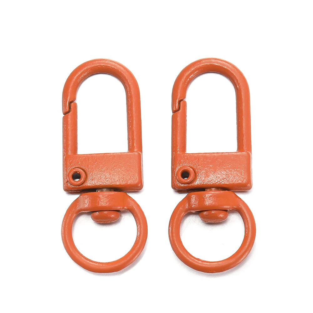 A pair of copper-colored alloy lobster clasp hooks for DIY jewelry making.