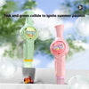 A pink and green bubble machine is shown against a light blue background with green foliage.