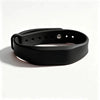 Black silicone wristband for access control with multiple holes.