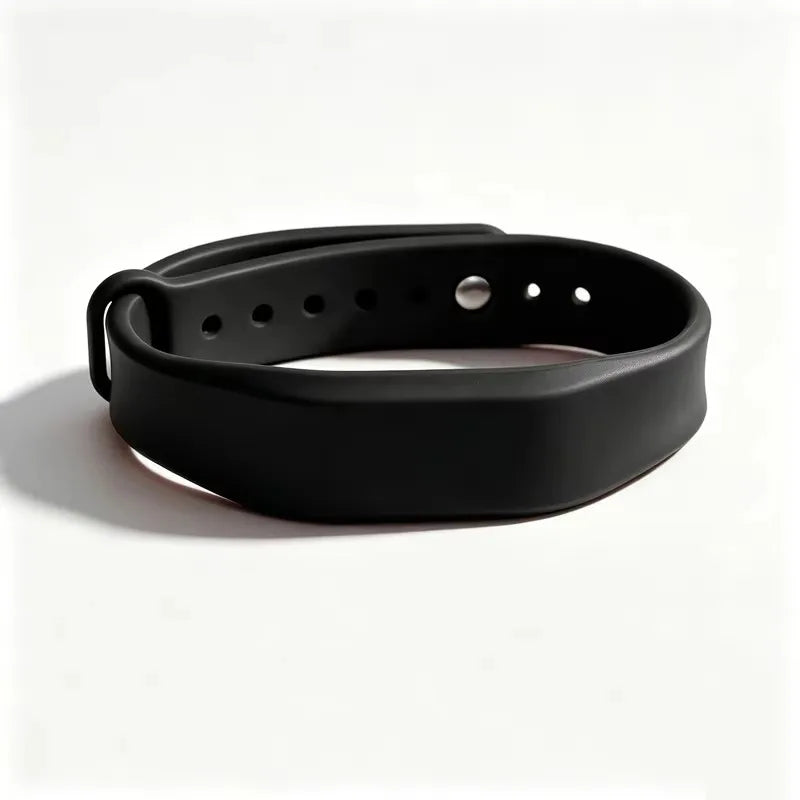 Black silicone wristband for access control with multiple holes.