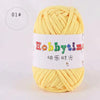 A ball of yellow soft T-shirt yarn for crochet and knitting is shown against a white background.