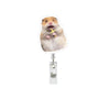 A cute hamster with a gold alligator clip is featured on a retractable badge reel.