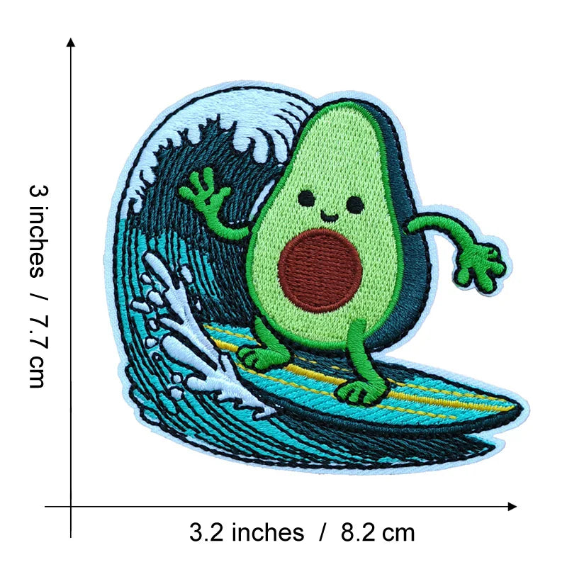 An embroidered patch depicting a green avocado character swimming in a blue sea wave.