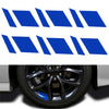 A set of six blue and white reflective wheel hub stickers displayed above a car wheel.