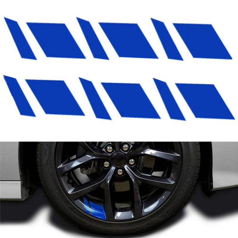 A set of six blue and white reflective wheel hub stickers displayed above a car wheel.