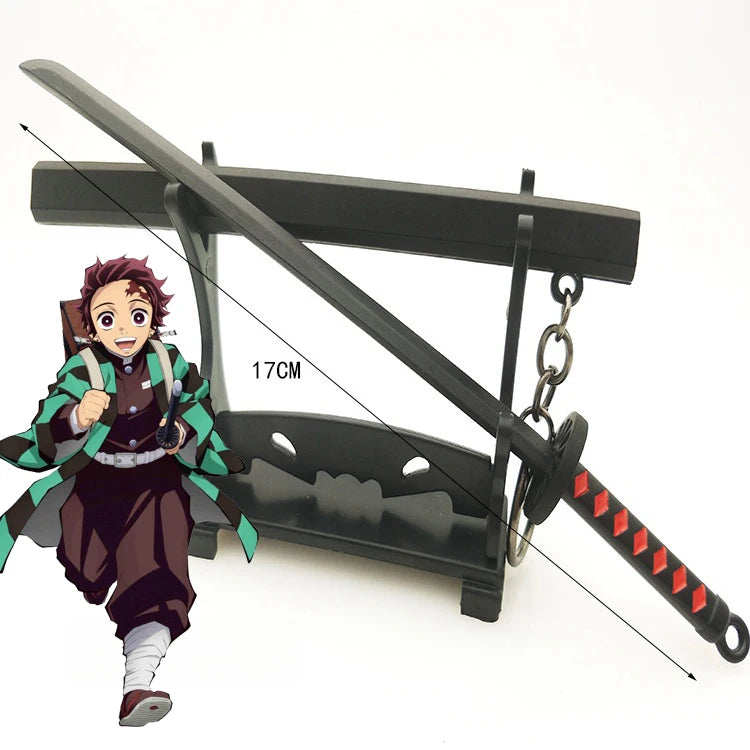 A figure of Tanjiro inspired metal sword replica is shown with a dark wooden frame and chain.