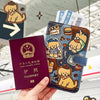A dark purple pu leather passport holder featuring a cartoon dog design and an embossed Chinese passport label.