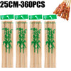 A set of natural bamboo skewers for BBQ and grilling, packaged in a box with green labels.
