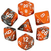 A collection of seven polyhedral dice in various shades of orange and black, shown at different angles.