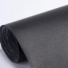 Roll of black self-adhesive PU leather repair patches, showing the textured surface.