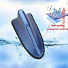 A blue aerodynamic shark fin car antenna with a signal amplifier shown submerged in water.