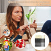 A woman is using an ergonomic crochet hook set for beginner crocheting, with various hooks and amigurumi toys displayed.