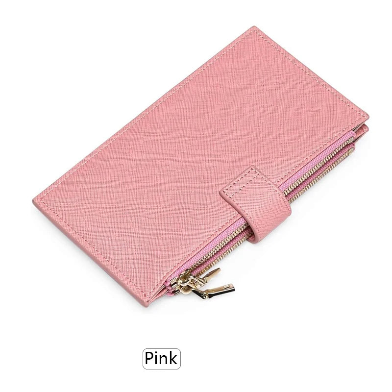 A pink RFID blocking extra-large bifold wallet with a double zipper security feature.