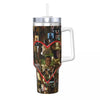 An insulated stainless steel tumbler featuring a heart design with various portrait photos.