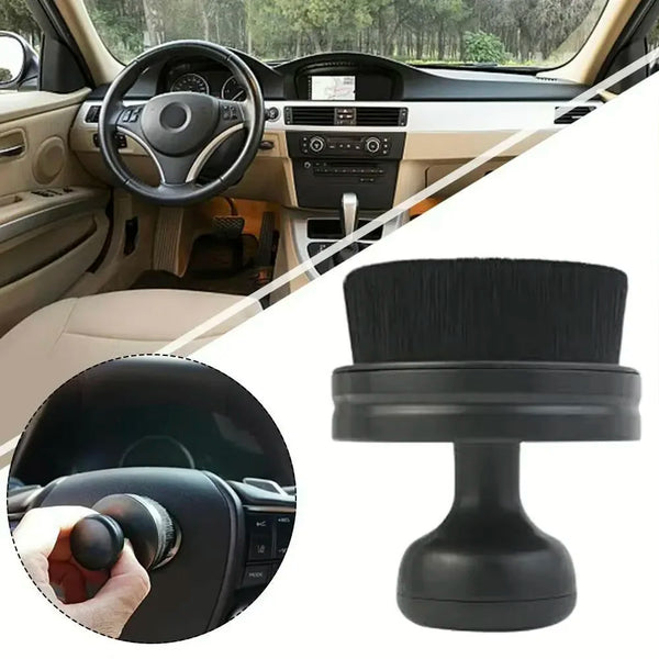 A black soft microfiber detailing brush with a handle used for cleaning tires, wheels, and interior surfaces.