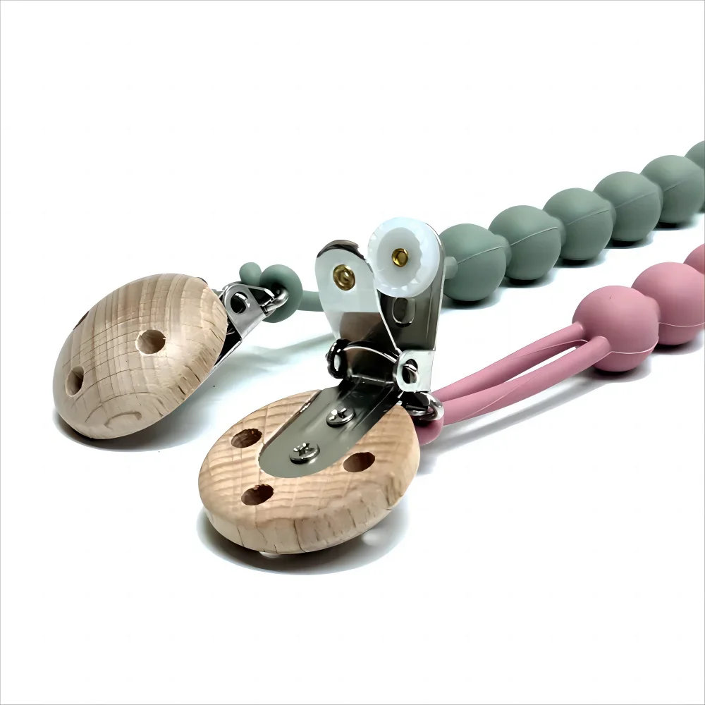 A food-grade silicone pacifier clip with an anti-lost chain, featuring a wooden component and silicone beads.