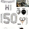 A kit for a balloon garland featuring silver and black foil numbers, including large numbers and heart shapes.