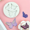 Silicone molds of butterflies in various shades and sizes for crafting projects