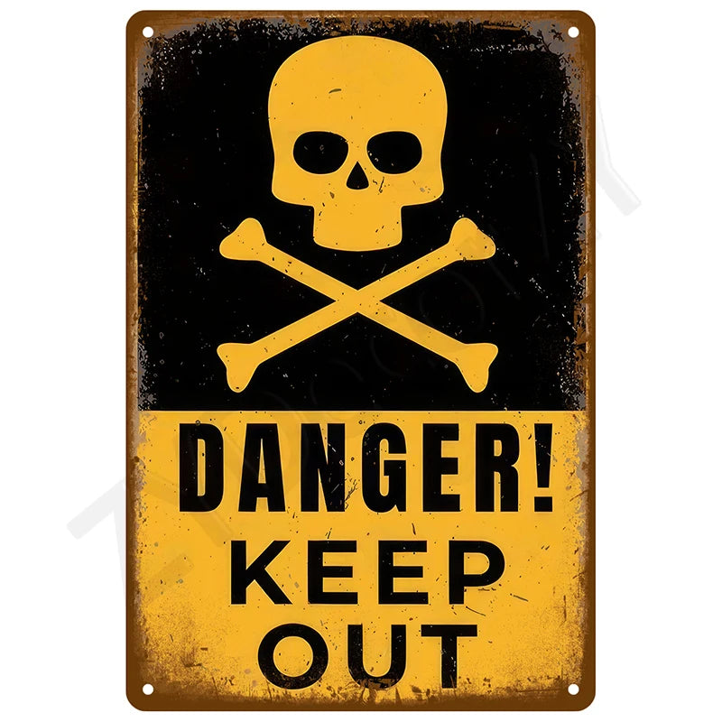 A vintage metal tin sign with a black background featuring a yellow skull and crossbones symbol and the text DANGER KEEP OUT.