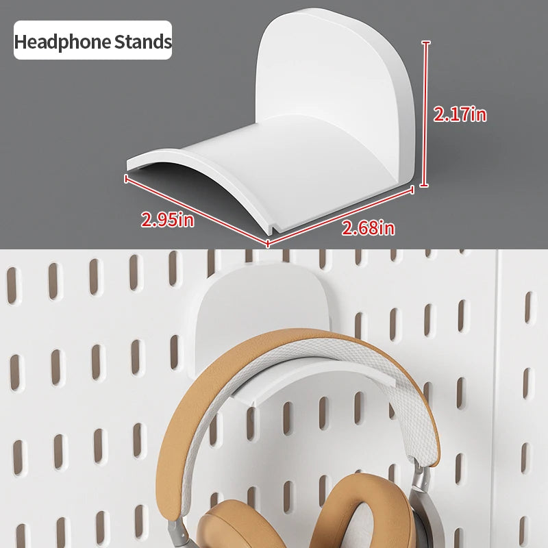 White headphone stands shown next to a pegboard organizer with hooks and shelves.