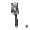 A black volumizing detangling hair comb with fine teeth shown against a white background.