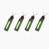 A pack of realistic cockroach prank gum toys with red antennae and green packaging.