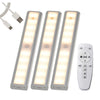 Three rectangular LED under-cabinet lights with a remote control for touch operation