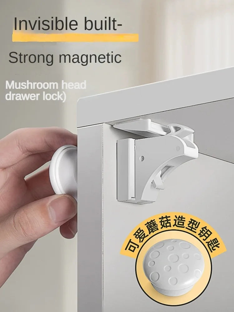 A hand is shown operating an invisible built strong magnetic mushroom head drawer lock on a cabinet.