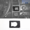 Carbon fiber grain center console trim cover for Ford F-150 vehicle interior.