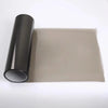 Roll of smoke black headlight and taillight tint film displayed next to a rectangular piece of tinted plastic.