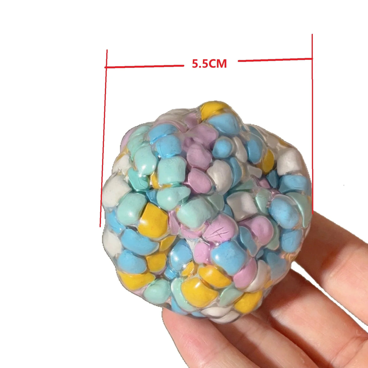 A hand holds a colorful, squishy sensory stress ball with various pastel-colored, bubbly textures.