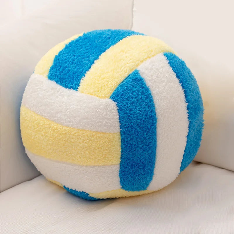 A fuzzy simulation volleyball plush toy pillow with blue and yellow stripes.