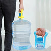 A hand is holding a clear water bucket with a yellow handle, demonstrating an ergonomic bottle carrier.