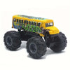 A yellow die-cast metal school bus pull-back toy with green graffiti paint on the side.
