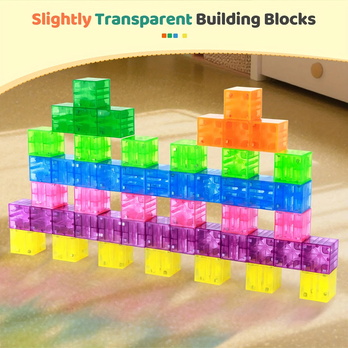A colorful set of slightly transparent building blocks stacked in various arrangements on a wooden surface.