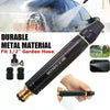 A black metal nozzle for a garden hose is shown spraying water, with the product and a hand visible.