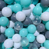 A close-up view of a large pack of colorful plastic ball pit balls in shades of white, light blue, and gray.