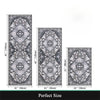 A set of three rectangular Bohemian non-slip kitchen rugs in varying sizes and patterns.