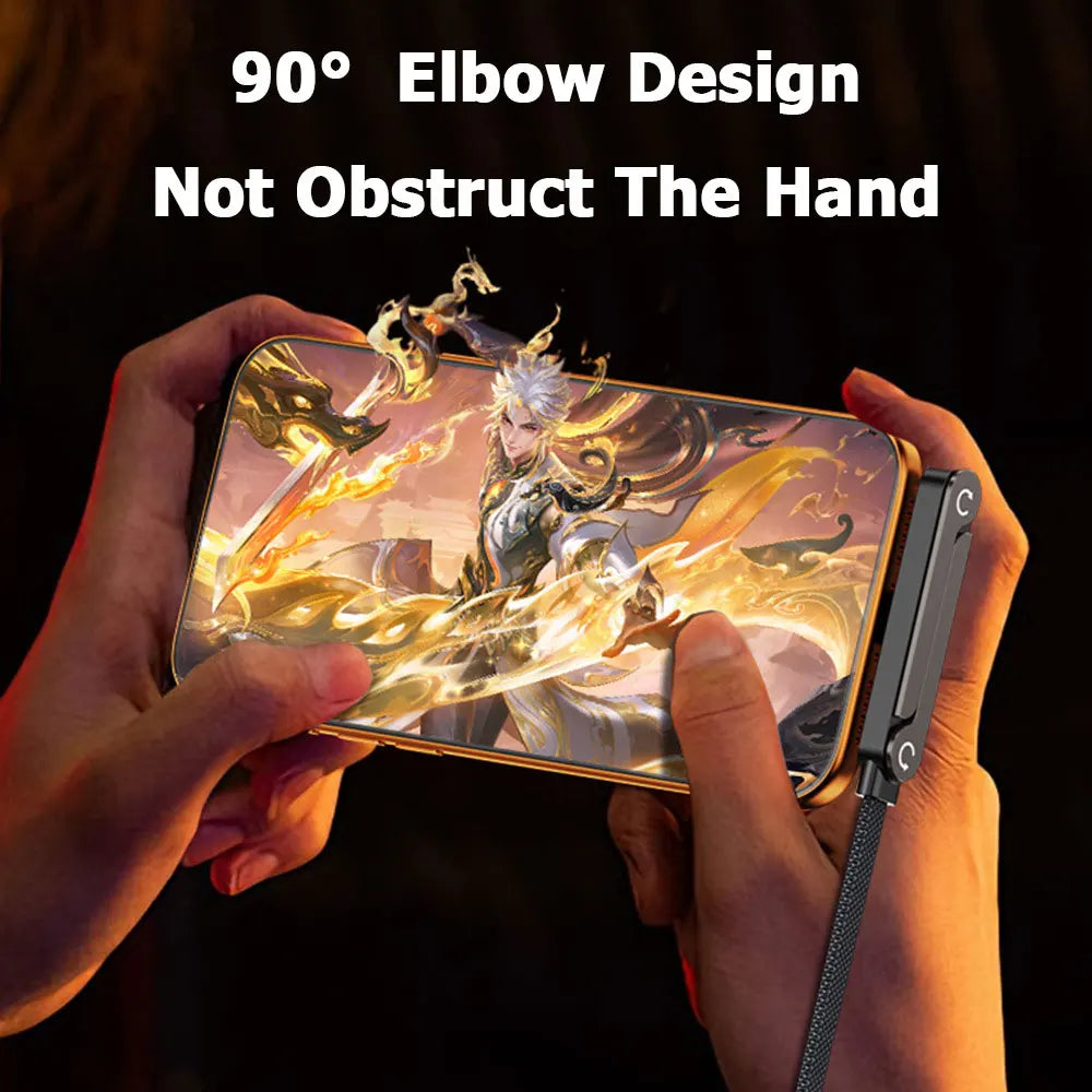 A hand holds a smartphone displaying an illustration, with a foldable charging cable and stand visible.