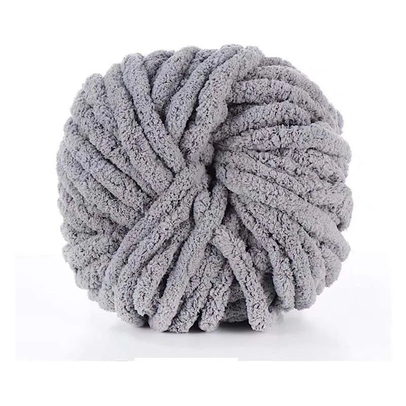 A ball of gray chunky chenille yarn used for knitting and crochet projects.