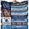 A dark blue fleece throw blanket featuring inspirational text for a son including love and pride messages