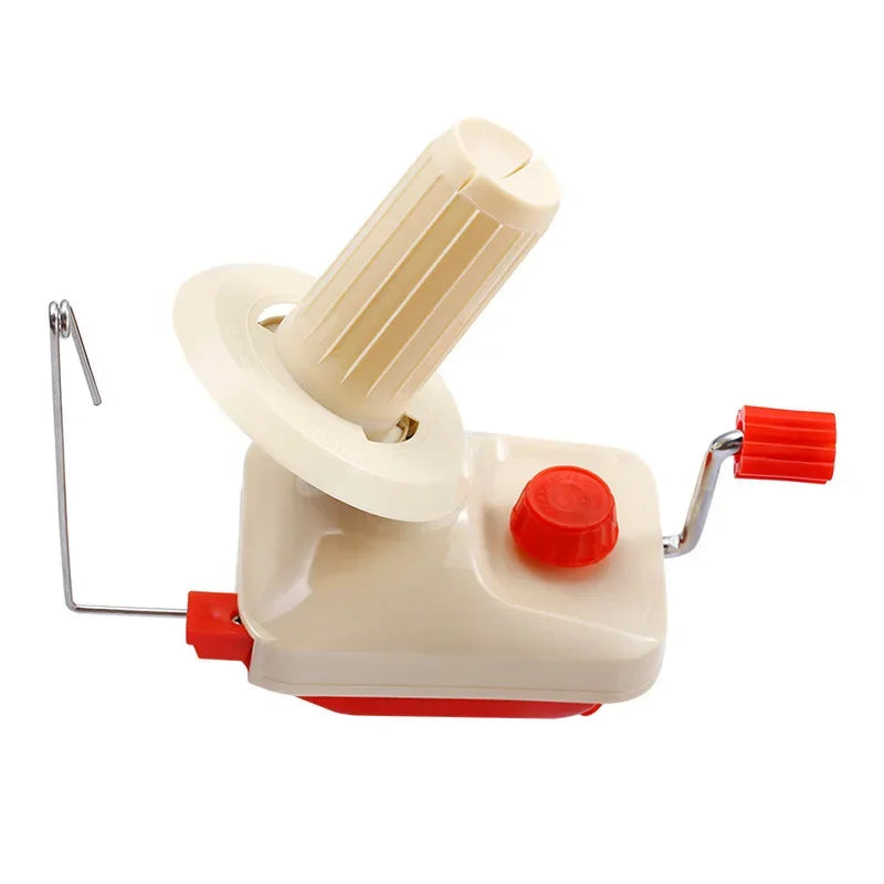 A beige hand crank yarn winder with a white spindle and red knob.