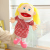 A blonde hand puppet with a red checkered dress and pink shoes is shown in a playful pose.
