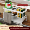 A white kitchen drain rack holds a green bottle and yellow blocks, designed for multi-use organization.