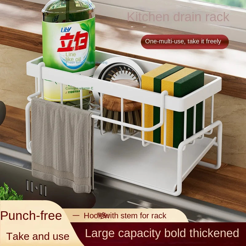 A white kitchen drain rack holds a green bottle and yellow blocks, designed for multi-use organization.
