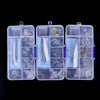 A clear plastic kit containing various precision tools, screws, and nose pads for repairing glasses.