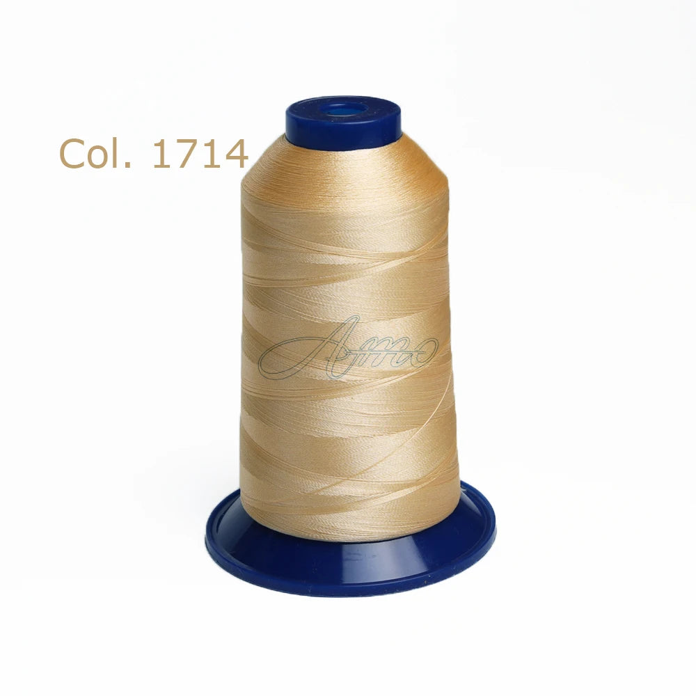 Spool of gold embroidery thread labeled Col. 1714