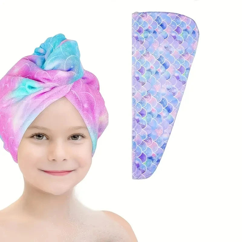 A pink and blue microfiber hair drying towel wrap is shown next to a child's face.